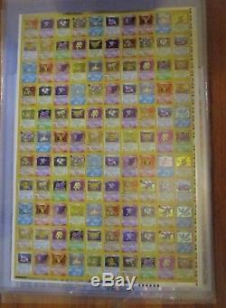 1999 FOSSIL Holo Rare Pokemon Card Uncut Sheet. 110 cards. KB Toys Promotion