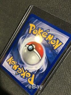1999 Pokemon Charizard Base Set Unlimited Rare Holographic Card 4/102 (Mint)