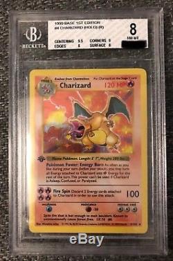 1st Edition Charizard Holo Base Set 4/102 Pokemon card BGS 8 NM/MT PSA regrade