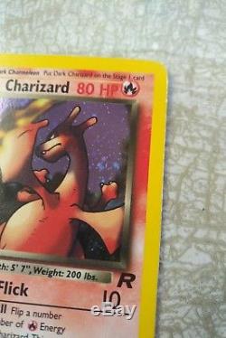 1st Edition Dark Charizard Holo near mint condition + free protective card cover