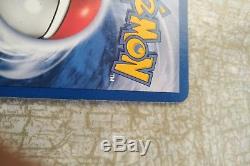 1st Edition Dark Charizard Holo near mint condition + free protective card cover