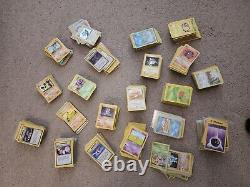 2.1k Damaged/HP VINTAGE Pokemon Card Lot with Holos, 1st Editions, Rares, and More