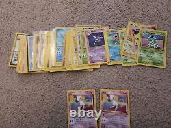 2.1k Damaged/HP VINTAGE Pokemon Card Lot with Holos, 1st Editions, Rares, and More