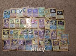 2.1k Damaged/HP VINTAGE Pokemon Card Lot with Holos, 1st Editions, Rares, and More