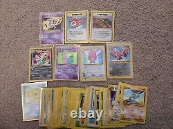 2.1k Damaged/HP VINTAGE Pokemon Card Lot with Holos, 1st Editions, Rares, and More