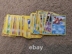 2.1k Damaged/HP VINTAGE Pokemon Card Lot with Holos, 1st Editions, Rares, and More