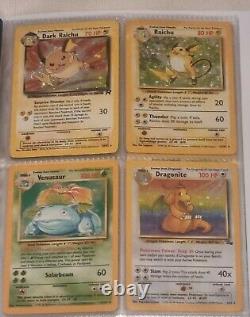 Base set Pokemon Cards. 1st Editions, holo's, charizard, rare. 215 cards. (Read)