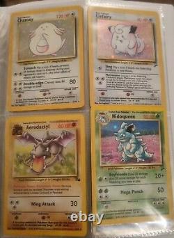 Base set Pokemon Cards. 1st Editions, holo's, charizard, rare. 215 cards. (Read)