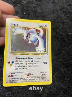 HOLO BLEED Lugia 9/111 Pokemon Card Neo Genesis WOTC with HOLO BLEED SWIRL