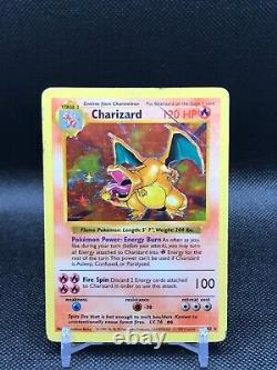 Pokemon Card Charizard Base Set (Shadowless) Holo Rare 4/102 DMG 1999