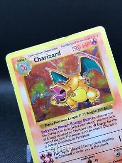 Pokemon Card Charizard Base Set (Shadowless) Holo Rare 4/102 DMG 1999