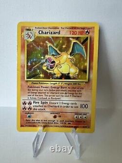 Pokémon TCG Charizard Base Set 4/102 Holo Unlimited Holo Rare (crease)