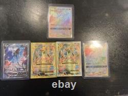 Rare Pokemon Cards including Tag teams, A alt art V and 2 Mega charizard