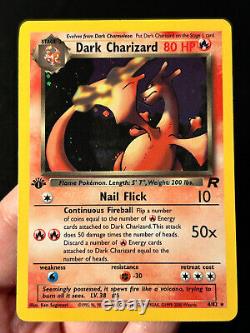 Carte Pokemon 1ère édition Dark Charizard de la Team Rocket 4/82 Holo Rare