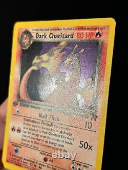 Carte Pokemon 1ère édition Dark Charizard de la Team Rocket 4/82 Holo Rare