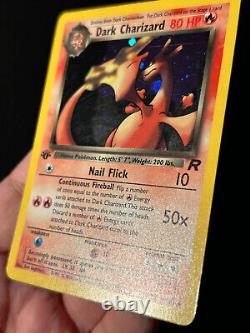 Carte Pokemon 1ère édition Dark Charizard de la Team Rocket 4/82 Holo Rare