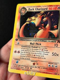 Carte Pokemon 1ère édition Dark Charizard de la Team Rocket 4/82 Holo Rare