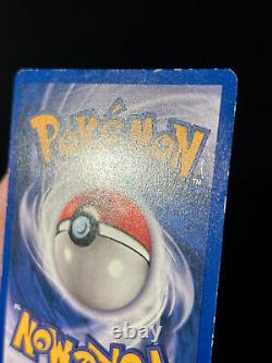 Carte Pokemon 1ère édition Dark Charizard de la Team Rocket 4/82 Holo Rare