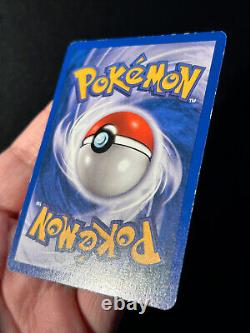 Carte Pokemon 1ère édition Dark Charizard de la Team Rocket 4/82 Holo Rare