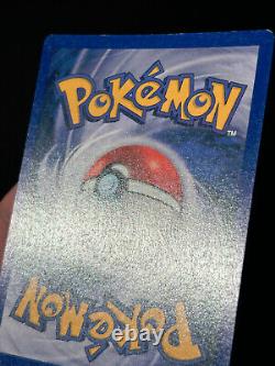 Carte Pokémon Charizard de la base PORTUGAISE Set 4/102 Holo Rare