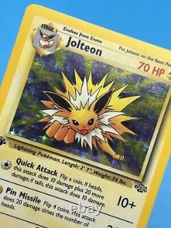 Carte Pokémon JOLTEON WOTC 1re Édition Jungle 4/64 HOLO LP