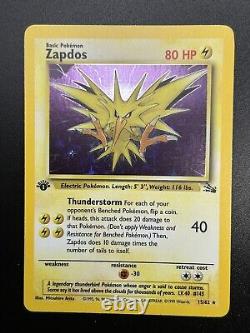 Carte Pokemon ZAPDOS WOTC 1ère édition Fossil 15/62 HOLO NM