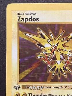 'Carte Pokemon rare de la 1ère édition Holo Bleed Shadowless Zapdos 16/102 Base Set en bon état'