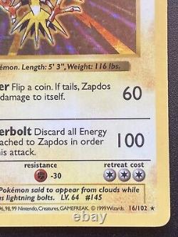 'Carte Pokemon rare de la 1ère édition Holo Bleed Shadowless Zapdos 16/102 Base Set en bon état'