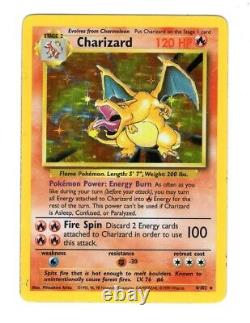 Carte rare holo illimitée Charizard Base Set 4/102 Pokemon TCG WOTC jouée LP