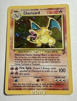 Carte rare holographique Charizard 4/130 de Pokemon TCG Base Set 2 Unlimited, en état joué LP de WOTC