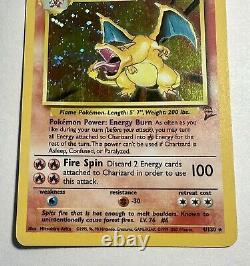 Carte rare holographique Charizard 4/130 de Pokemon TCG Base Set 2 Unlimited, en état joué LP de WOTC