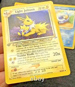 Cartes Pokémon 1ère Édition Ensemble de 3 : Jolteon Lumière, Flareon Lumière, Vaporeon Lumière