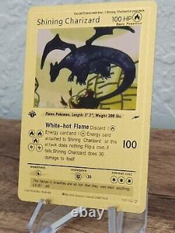 Charizard Brillant Ultra Rare 1ère Édition 107/105 Gold Foil Pokemon Card