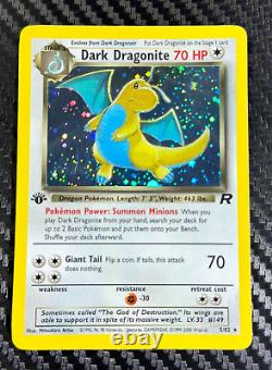 Dark Dragonite Holo 5/82 Team Rocket Unlimited translates to 'Dragonite Obscur Holo 5/82 Team Rocket Illimité' in French.