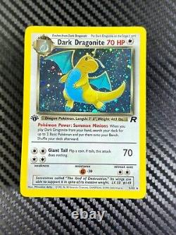 Dark Dragonite Holo 5/82 Team Rocket Unlimited translates to 'Dragonite Obscur Holo 5/82 Team Rocket Illimité' in French.