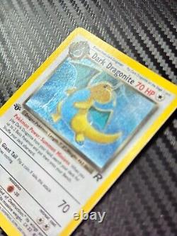 Dark Dragonite Holo 5/82 Team Rocket Unlimited translates to 'Dragonite Obscur Holo 5/82 Team Rocket Illimité' in French.