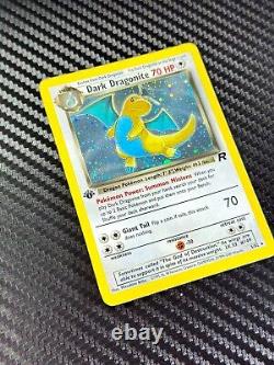 Dark Dragonite Holo 5/82 Team Rocket Unlimited translates to 'Dragonite Obscur Holo 5/82 Team Rocket Illimité' in French.