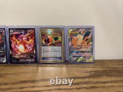 Ensemble complet de cartes Pokémon contenant un Shaymin Ex en or, un Charizard Vstar et plus encore