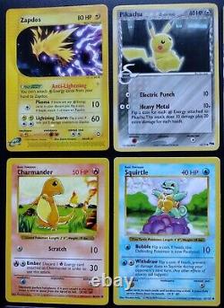 Lot de 21 cartes Pokemon TCG mélangeant des cartes vintage et modernes - État indiqué pour chaque carte