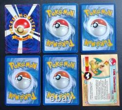 Lot de 21 cartes Pokemon TCG mélangeant des cartes vintage et modernes - État indiqué pour chaque carte